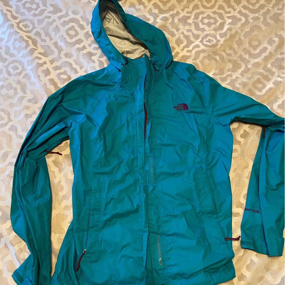 Teal North Face rain coat